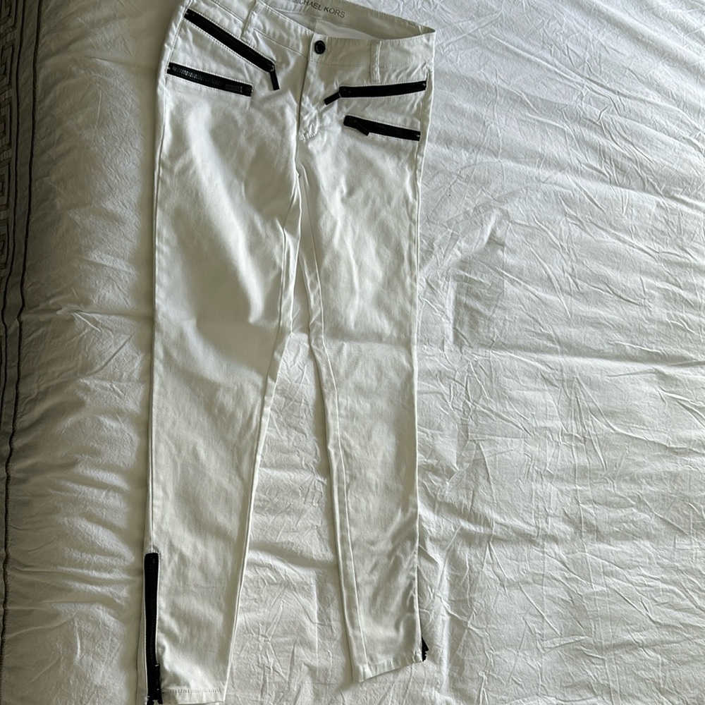 Michel Kors white denim with black zippers